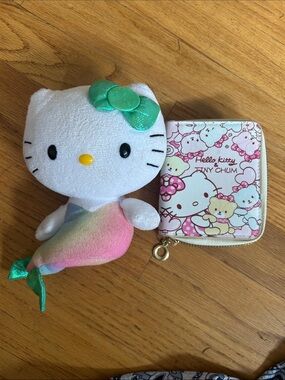 Hello Kitty Plush Mermaid Doll and zipp around wallet 
Rainbow Tail